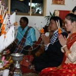 Both Lao men and women wearing traditional costumes in wedding