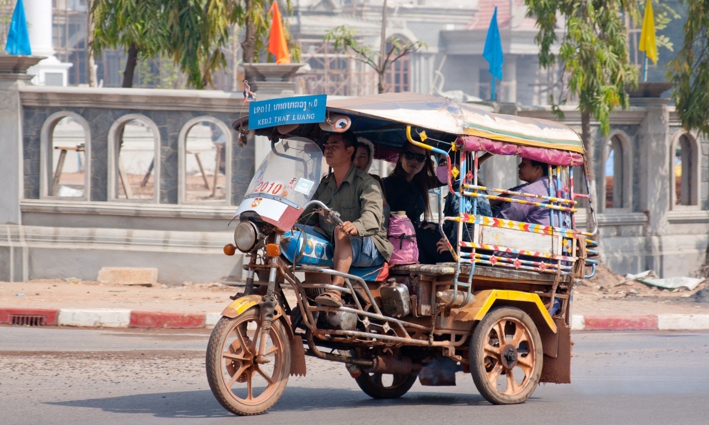 Get around Vientiane by tuk tuk