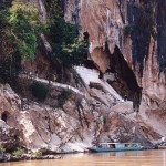 Take a boat to visit Pak Ou Cave