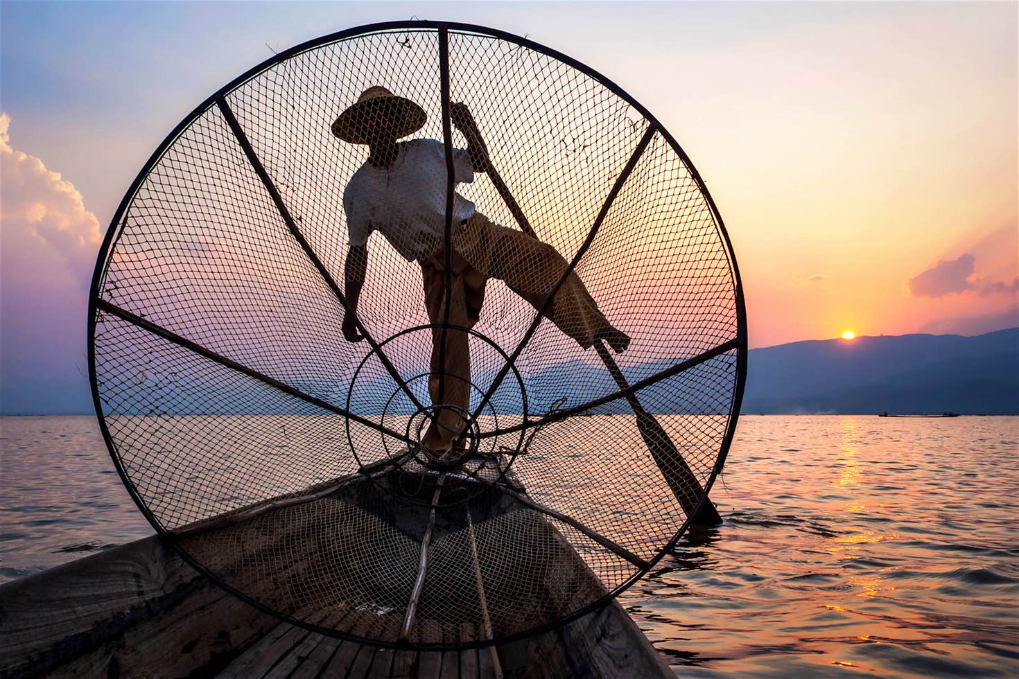 A fisherman is working in Inle Lake